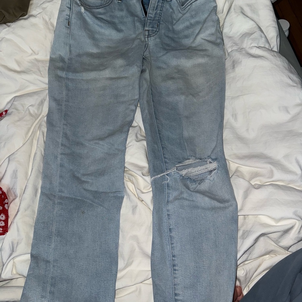 Distressed Light Blue Denim Jeans